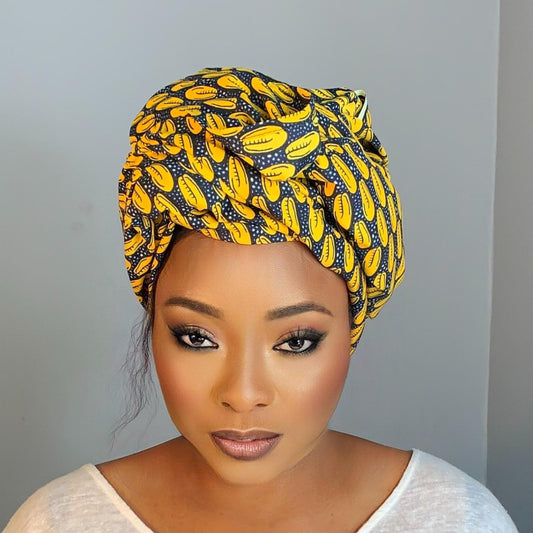 Fourlard-Turban mit gelbem Cauri-Muster aus afrikanischem Wachs