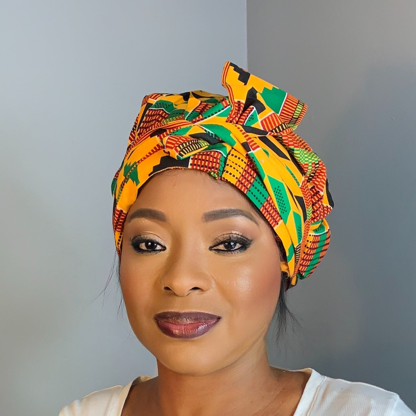 Bonnet Satin en turban motif Kente